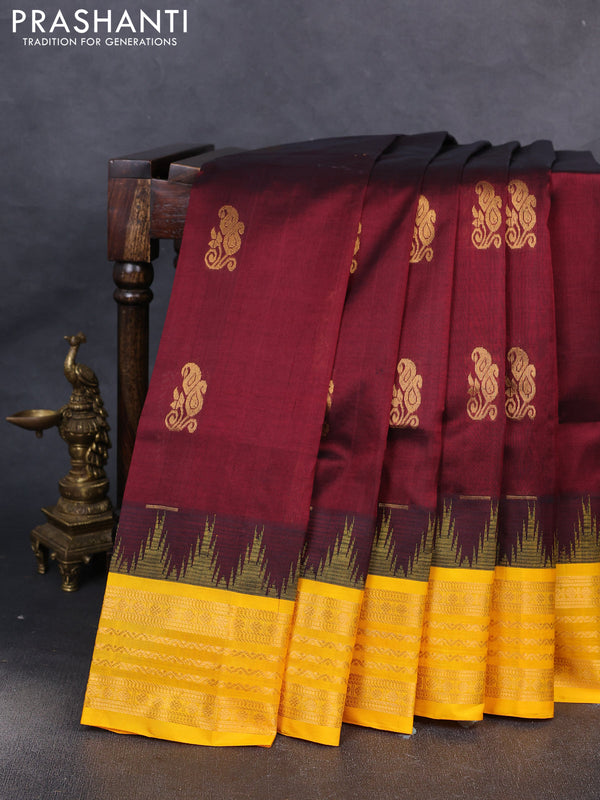 Kuppadam silk cotton saree deep maroon and mango yellow with zari woven buttas and temple design zari woven border