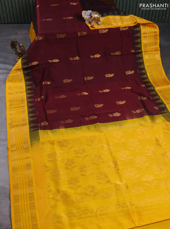 Kuppadam silk cotton saree deep maroon and mango yellow with zari woven buttas and temple design zari woven border