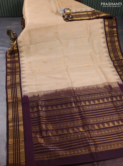 Kuppadam silk cotton saree sandal and deep maroon with zari woven buttas and temple design zari woven border