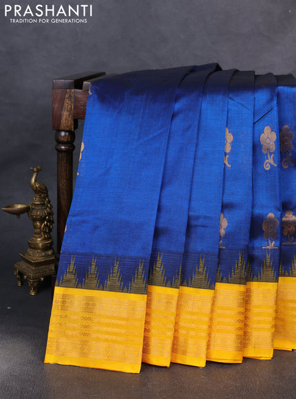 Kuppadam silk cotton saree peacock blue and yellow with zari woven buttas and temple design zari woven border