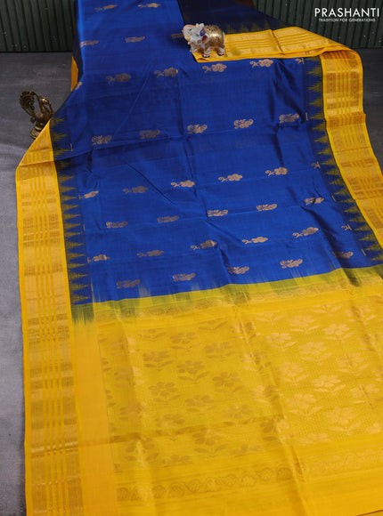 Kuppadam silk cotton saree peacock blue and yellow with zari woven buttas and temple design zari woven border