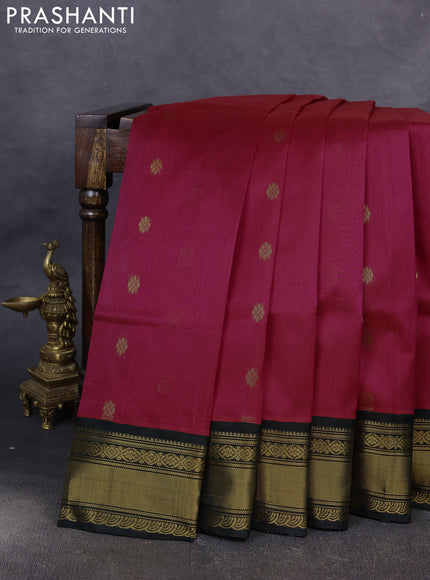 Kuppadam silk cotton saree pink and bottle green with zari woven buttas and zari woven border