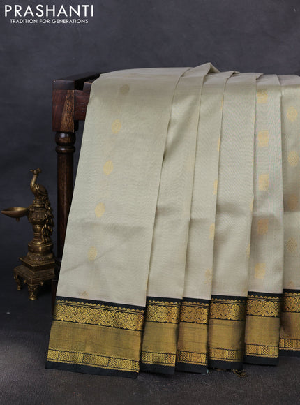 Kuppadam silk cotton saree pista green and bottle green with zari woven buttas and zari woven border