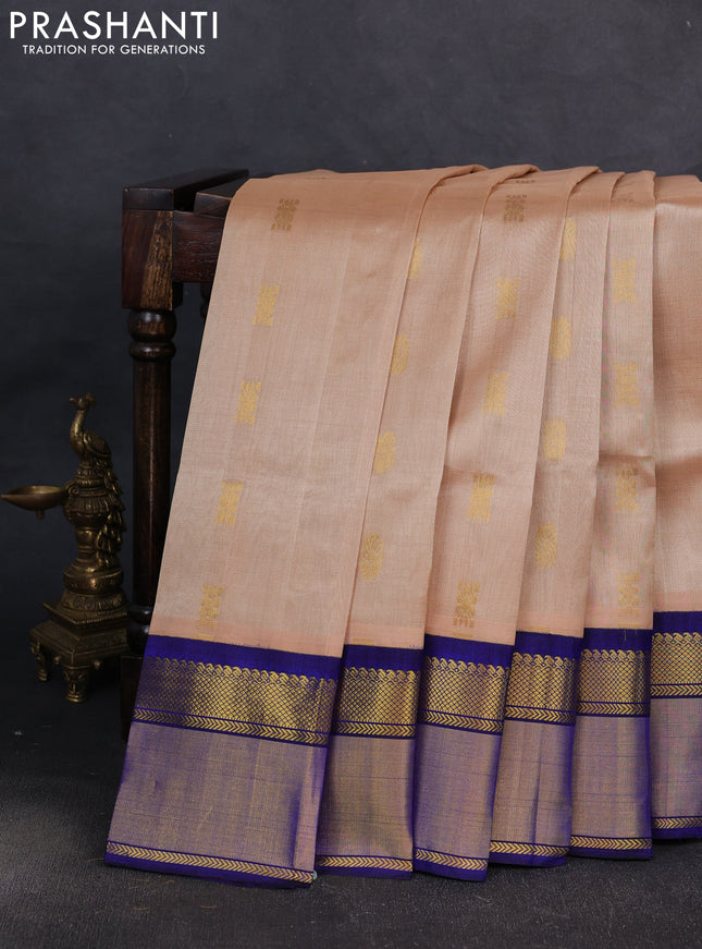 Kuppadam silk cotton saree sandal and blue with zari woven buttas and zari woven border