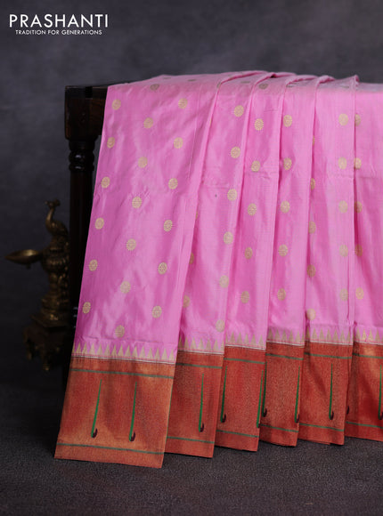 Pure paithani silk saree light pink and red with allover zari woven buttas and zari woven muniya butta border