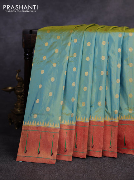 Pure paithani silk saree dual shade of teal green and red with allover zari woven buttas and zari woven muniya butta border