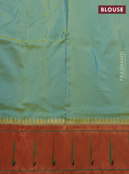 Pure paithani silk saree dual shade of teal green and red with allover zari woven buttas and zari woven muniya butta border