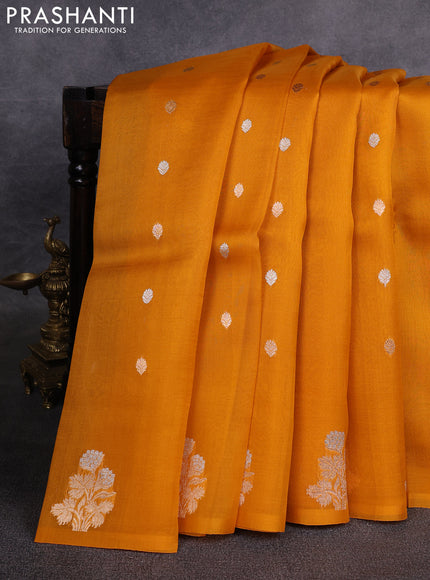 Banarasi organza saree mango yellow with silver & gold zari woven buttas in borderless style