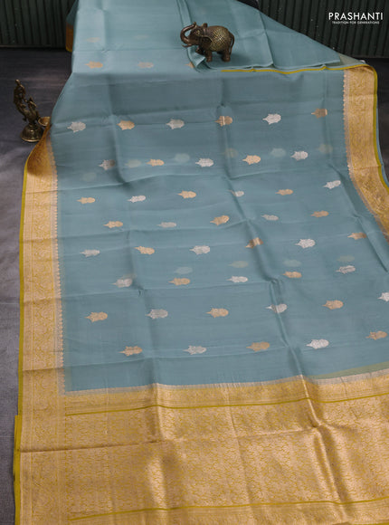 Banarasi organza saree pastel blue and yellow with zari woven buttas and zari woven border