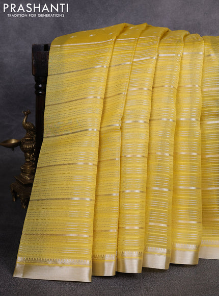 Banarasi organza saree lime yellow with allover zari stripes pattern and zari woven border
