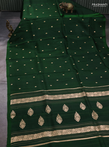 Banarasi organza saree dark green with zari woven buttas and satin border