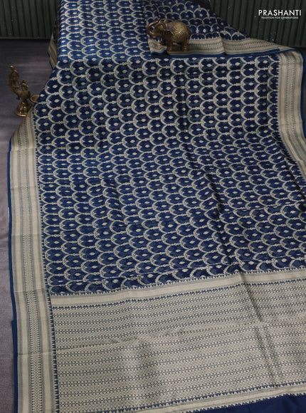 Banarasi organza saree peacock blue with allover banarasi zari weaves and zari woven border