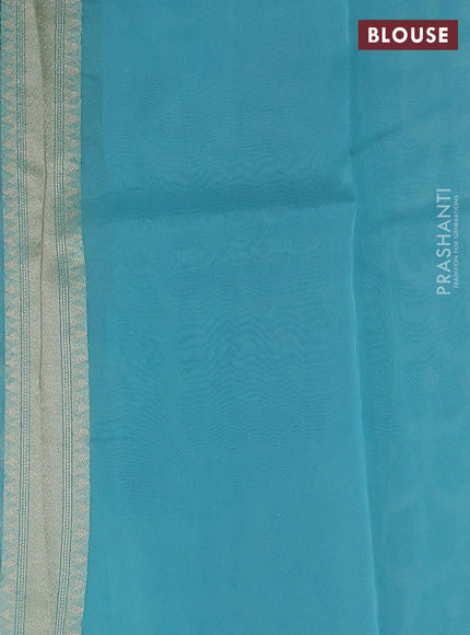 Banarasi organza saree teal blue with allover banarasi zari weaves and zari woven border