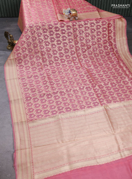 Banarasi organza saree peach pink with allover banarasi zari weaves and zari woven border
