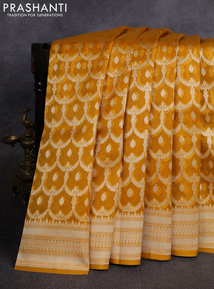 Banarasi organza saree mango yellow with allover banarasi zari weaves and zari woven border