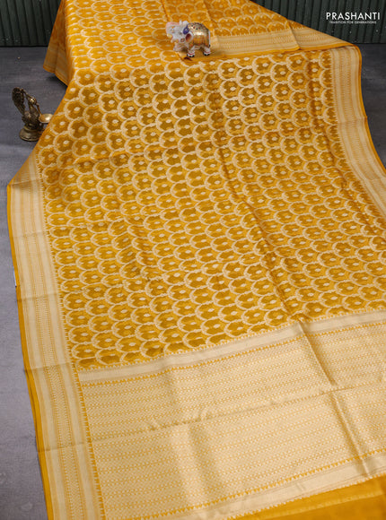 Banarasi organza saree mango yellow with allover banarasi zari weaves and zari woven border