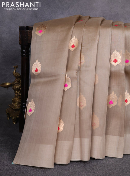 Banarasi organza saree beige with zari woven buttas in borderless style