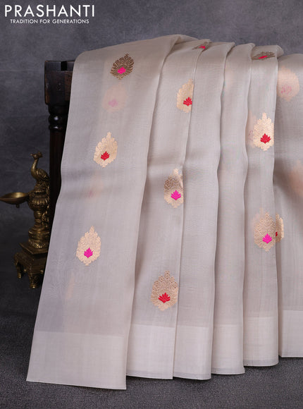 Banarasi organza saree grey with zari woven buttas in borderless style