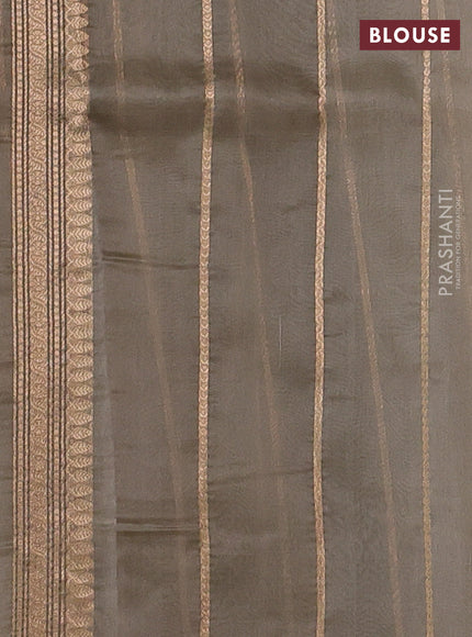 Banarasi organza saree beige with zari woven buttas in borderless style