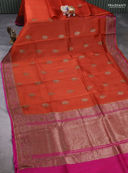 Banarasi organza saree orange and pink with woven buttas and banarasi style border