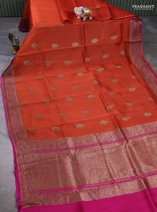 Banarasi organza saree orange and pink with woven buttas and banarasi style border