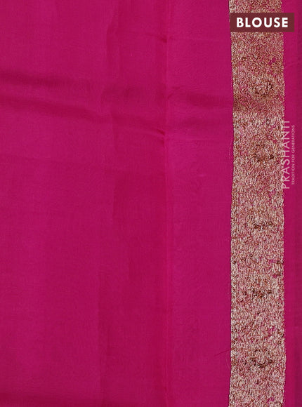 Banarasi organza saree orange and pink with woven buttas and banarasi style border