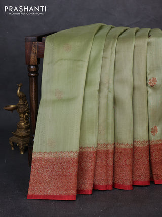 Banarasi organza saree pastel green and rust shade with woven buttas and banarasi style border