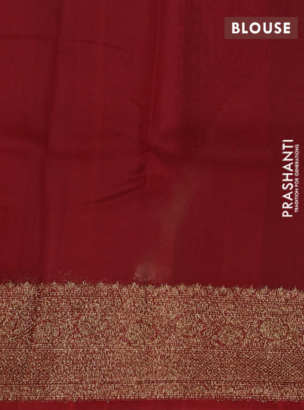 Banarasi organza saree pastel green and rust shade with woven buttas and banarasi style border