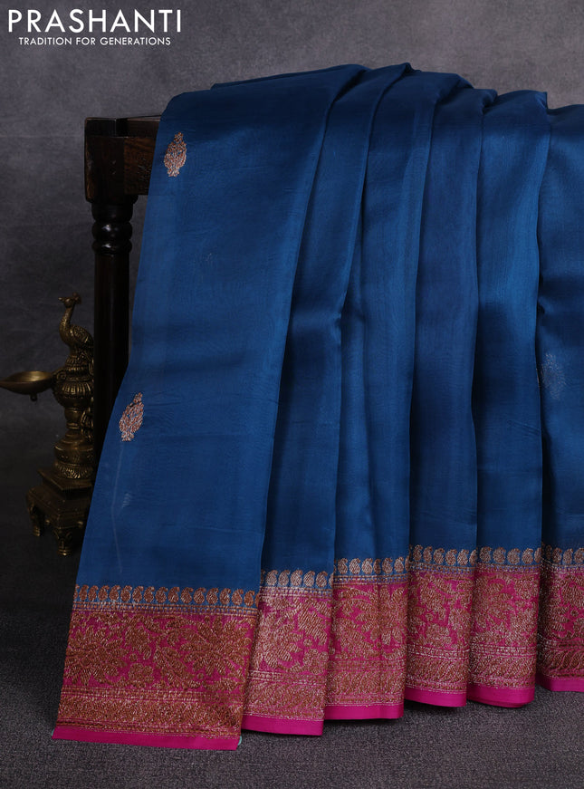 Banarasi organza saree cs blue and pink with woven buttas and banarasi style border