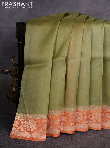 Banarasi organza saree pastel green and orange with zari woven buttas and zari woven border