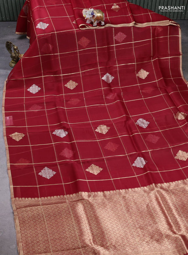 Banarasi organza saree red with allover zari checks & buttas and zari woven piping border
