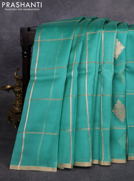 Banarasi organza saree teal green with allover zari checks & buttas and zari woven piping border