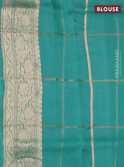 Banarasi organza saree teal green with allover zari checks & buttas and zari woven piping border