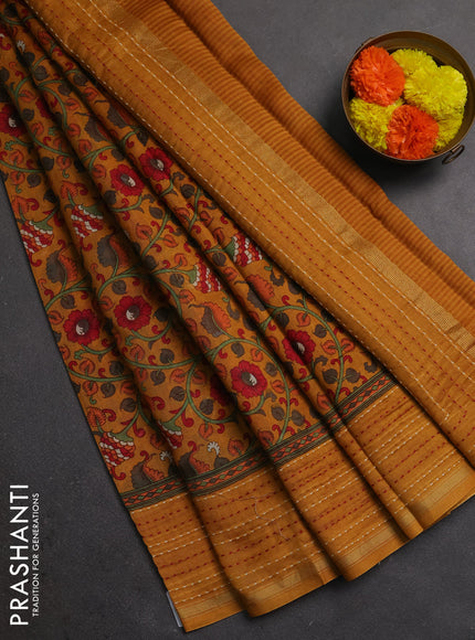 Chanderi silk cotton saree dark mustard with allover kalamkari prints and kantha stitch work border