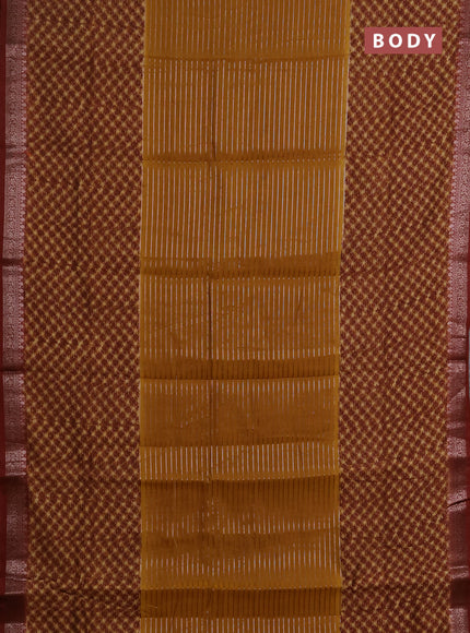 Chanderi silk cotton saree dark mustard and brown with allover thread & zari weaves and long printed banarasi style border