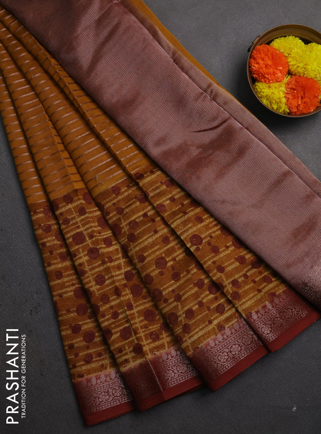 Chanderi silk cotton saree dark mustard and rust shade with allover thread & zari weaves and long printed banarasi style border