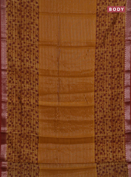 Chanderi silk cotton saree dark mustard and rust shade with allover thread & zari weaves and long printed banarasi style border