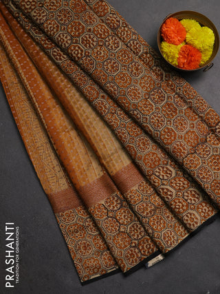Chanderi silk cotton saree dark mustard and black with allover prints & banarasi weaves and banarasi style printed border