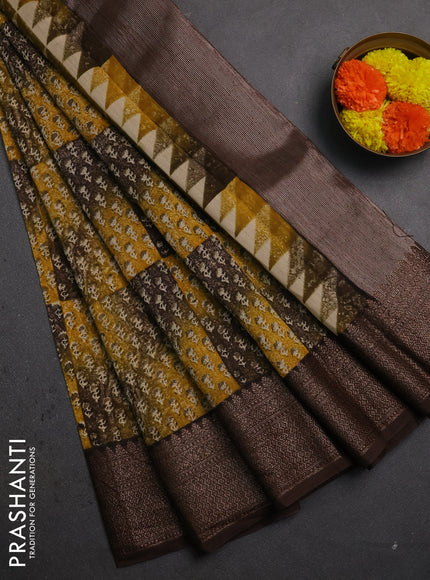 Chanderi silk cotton saree yellow and coffee brown with allover prints and banarasi style border