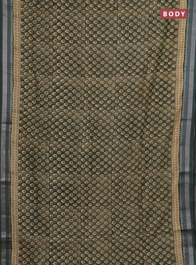 Chanderi silk cotton saree bottle green with allover prints and silver zari woven border