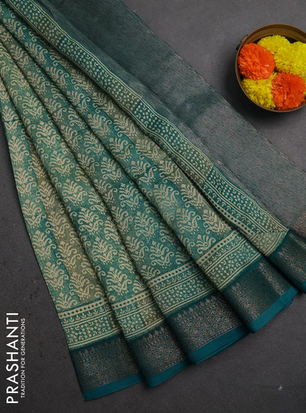 Chanderi silk cotton saree teal green with allover prints and banarasi style border