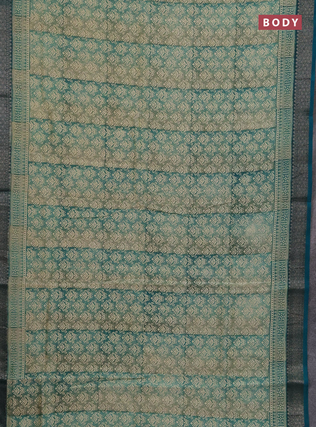 Chanderi silk cotton saree teal green with allover prints and banarasi style border