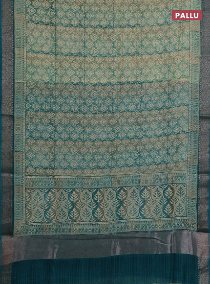 Chanderi silk cotton saree teal green with allover prints and banarasi style border