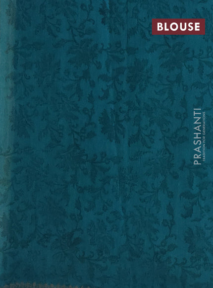 Chanderi silk cotton saree teal green with allover prints and banarasi style border