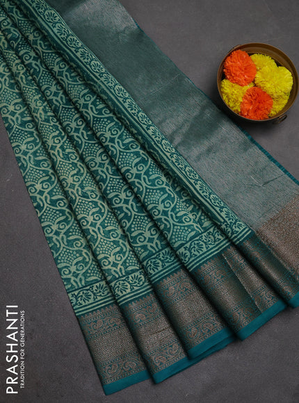 Chanderi silk cotton saree teal green with allover prints and banarasi style border
