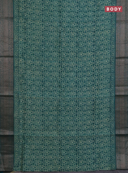 Chanderi silk cotton saree teal green with allover prints and banarasi style border