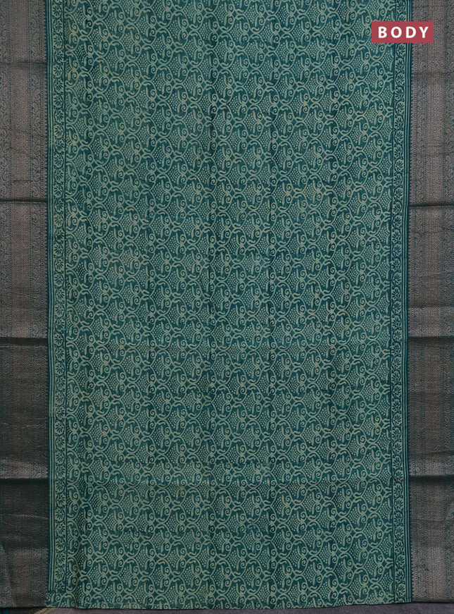 Chanderi silk cotton saree teal green with allover prints and banarasi style border