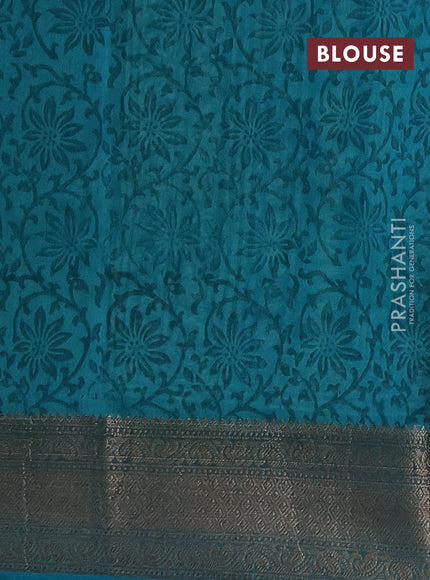 Chanderi silk cotton saree teal green with allover prints and banarasi style border