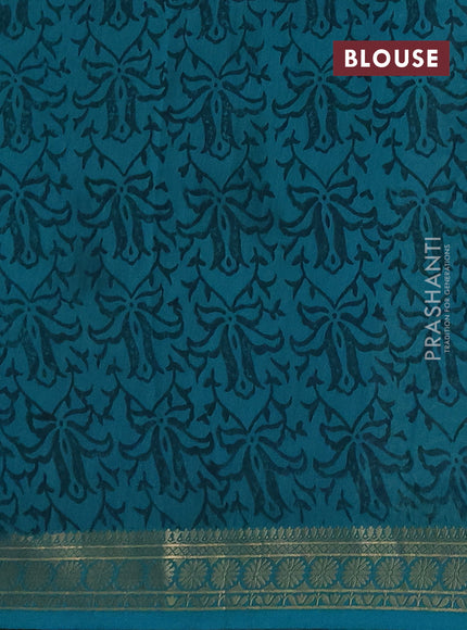 Chanderi silk cotton saree teal green with allover prints and thread woven border