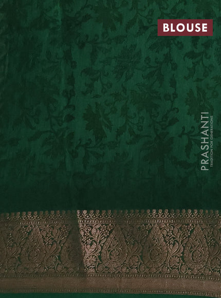 Chanderi silk cotton saree green with allover prints and banarasi style border